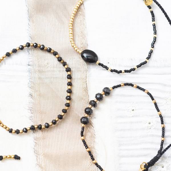 Ruby zwarte onyx goud armband sfeer